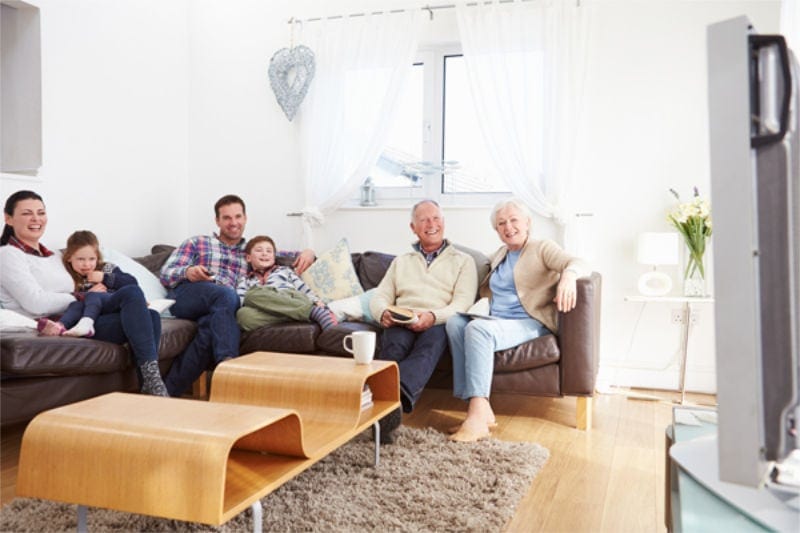 Multi Generation Family Watching Television